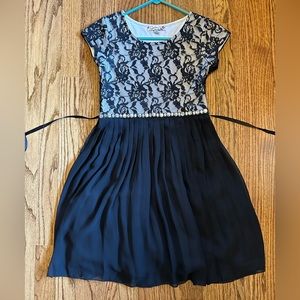 Black and white formal dress. Lace with rhinestone accents.